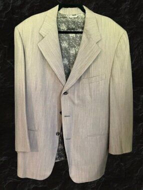 A light beige three-button